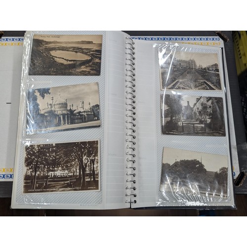 184 - Postcard album with 300 x mainly black and white mixed postcards - unposted dating early 1900s upwar... 