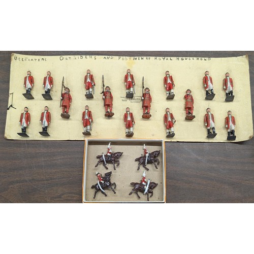 140 - Vintage early Britains lead beefeaters, footmen and outriders on original card