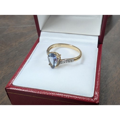 360 - Solid 10k/375 hallmarked gold large teardrop shaped blue topaz and diamond ring - size N 1/2 - 1.9gm