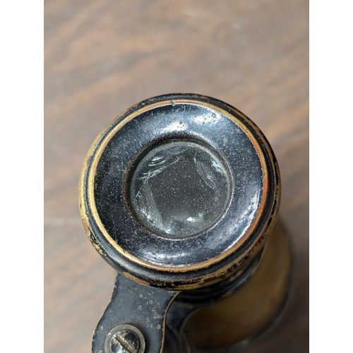 131 - Pair of 1895 French horse racing binoculars - couple of dents and lens damaged but doesn't affect th... 