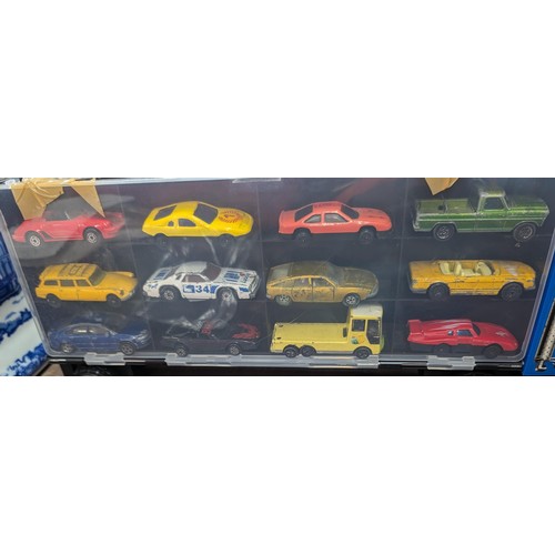 31 - Transporter shaped toy car storage/carrier with 24 x assorted toy cars