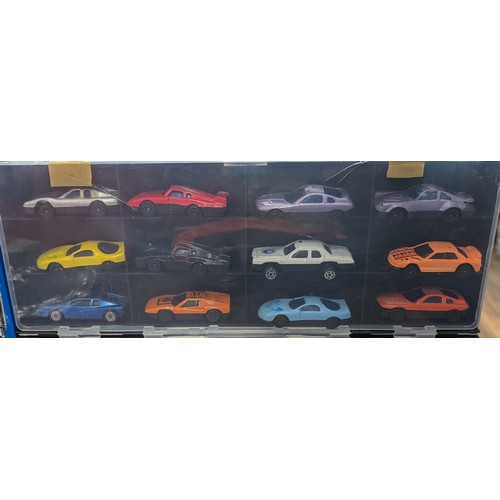 31 - Transporter shaped toy car storage/carrier with 24 x assorted toy cars