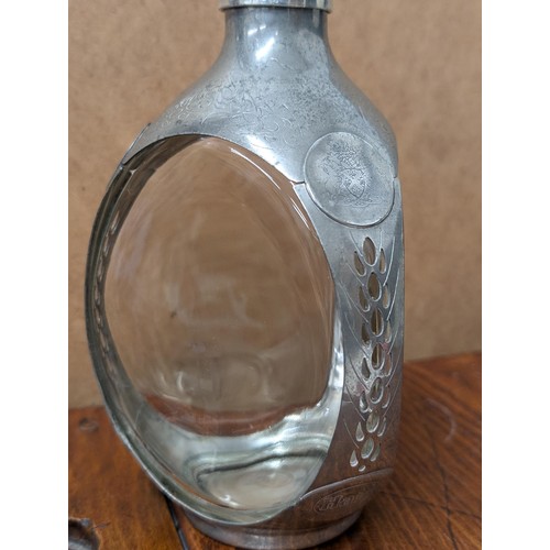 273 - Rare Haig dimple bottle with Dutch pewter casing