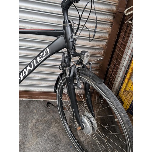 246 - Mantra E-bike with charger - spec: front suspension, Shimano alpine gears, axa lights, kickstand. Wo... 