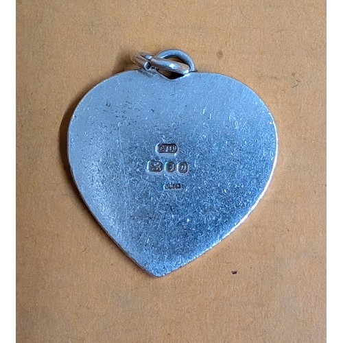 483 - Hallmarked silver and gilt large heart pendant, stamped on rear