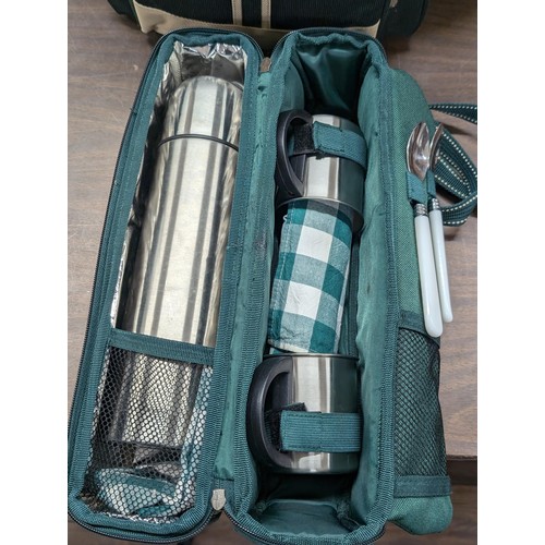 432 - AS new picnic rucksack with contents and flask set in canvas zip case