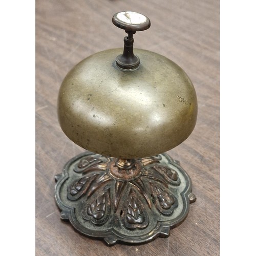 101 - Ornate based brass reception bell-damaged top