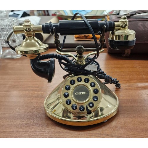 63 - Vintage look gold and black push button telephone