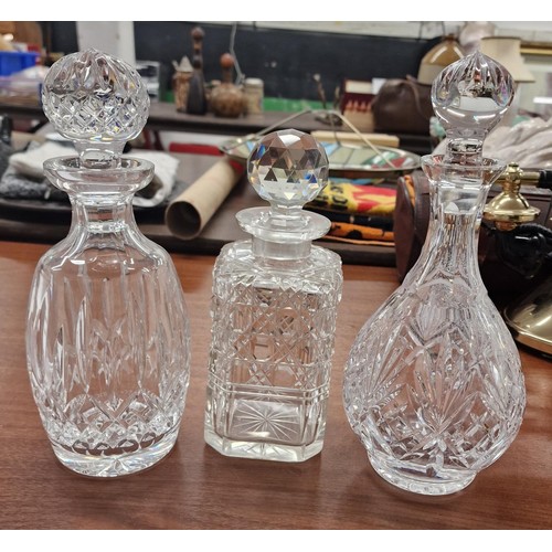 69 - 3 x non matching glass decanters with stoppers- tallest being approximately 10.75