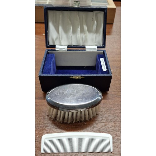 310 - Hallmarked silver top brush and comb set in box