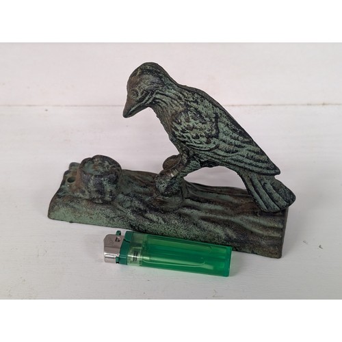240 - Vintage patinated cast woodpecker door knocker
