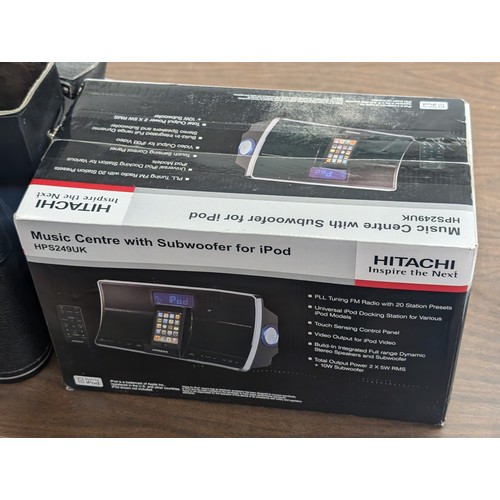 215 - Still factory sealed Hitachi HPS 249 music centre with Ipod subwoofer