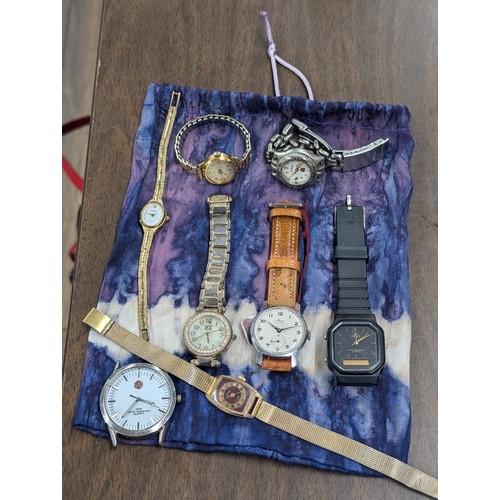 222 - Pouch with assorted wind-up and quartz watches, currently non-working so offered for spare or repair