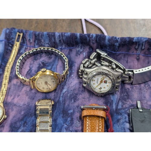 222 - Pouch with assorted wind-up and quartz watches, currently non-working so offered for spare or repair