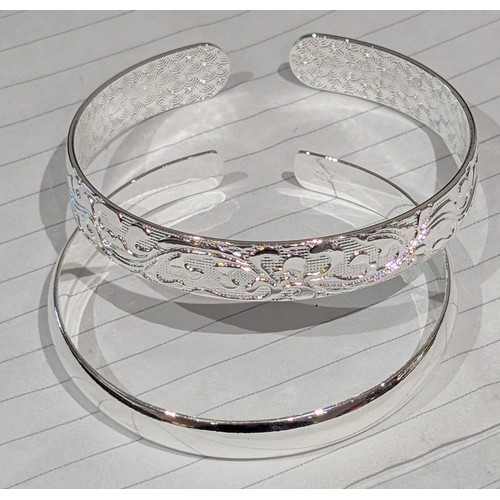 203 - Pair of Sterling Silver Cuff Bangles, One Plain & One Engraved Patterning