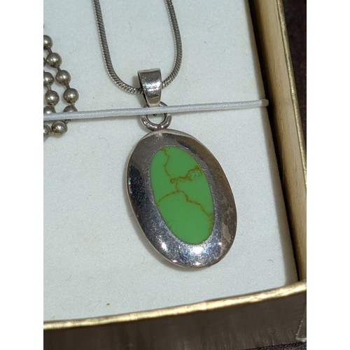 187 - A Les Baker Style Indian Native Reversible Sterling Silver Pendant Necklace, and a Fused Glass Penda... 