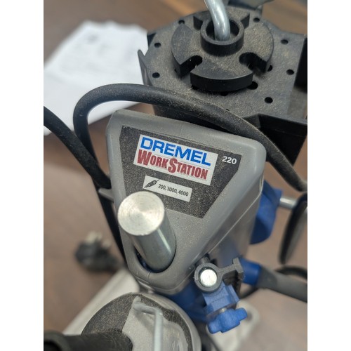 42 - Dremel Model 3000 Rotary Tool with WorkStation 220 Drill Press Stand and 335 Plunge Router Attachmen... 