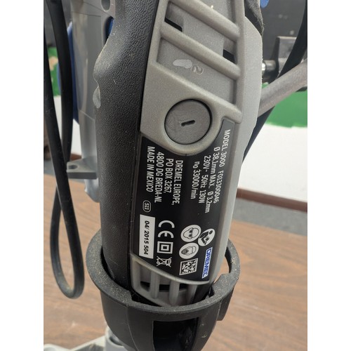 42 - Dremel Model 3000 Rotary Tool with WorkStation 220 Drill Press Stand and 335 Plunge Router Attachmen... 
