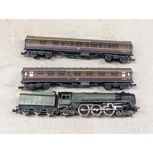 2 - Three Trix N Gauge Model Railway Components: A 4-6-2 Steam Locomotive With Tender and Two BR Maroon ... 