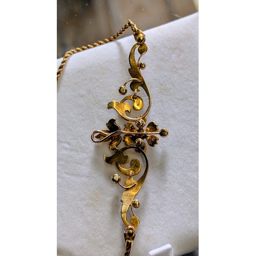 415 - Edwardian Festoon Necklace with Seed Pearls in 15 Carat Gold - 9.2 gm
On closer inspection the chain... 