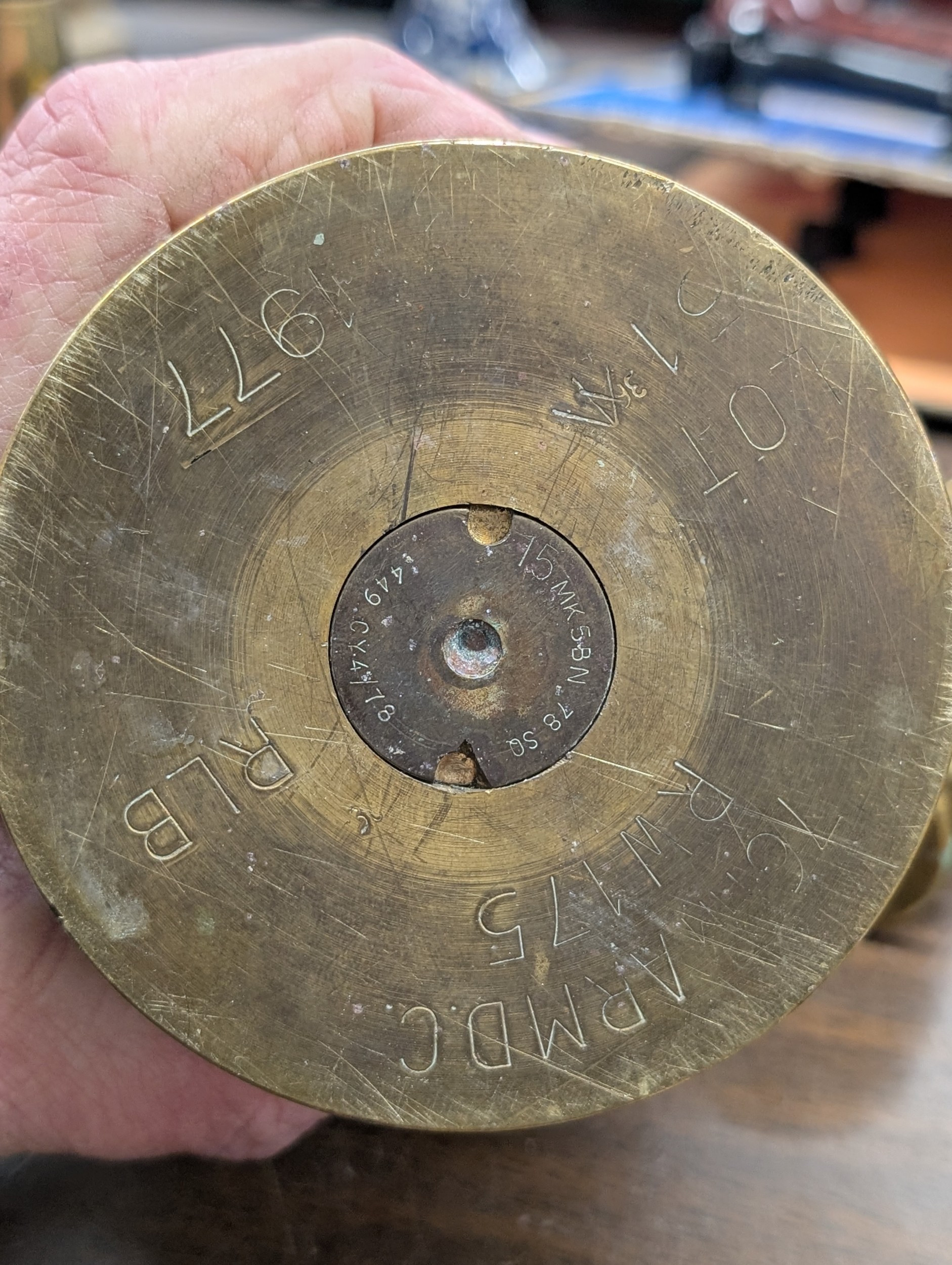 A Collection of Inert Military Ordnance and Spent Brass Artillery Shell ...