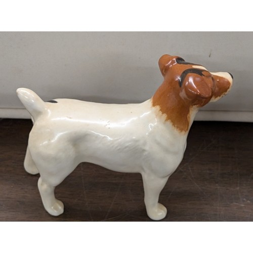 25 - Two Beswick Ceramic Dog Figurines including a Jack Russell Terrier and English Bulldog Puppies