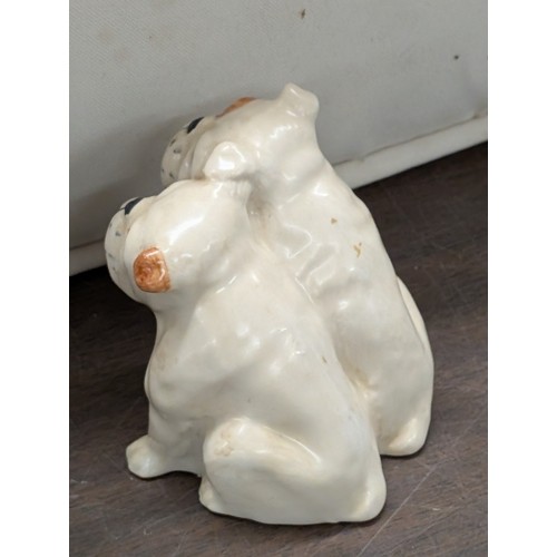 25 - Two Beswick Ceramic Dog Figurines including a Jack Russell Terrier and English Bulldog Puppies