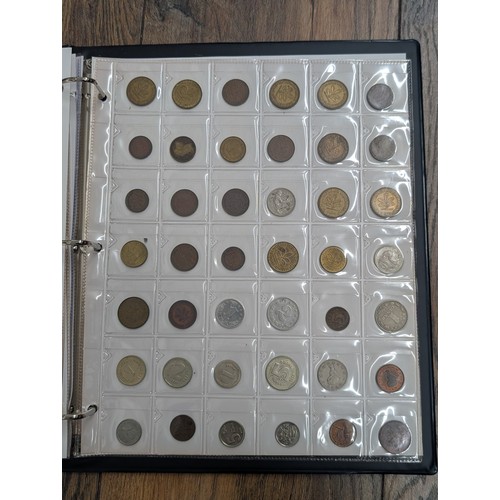 A Collection of International Coins from the UK, FR, IT, JP, and Others ...