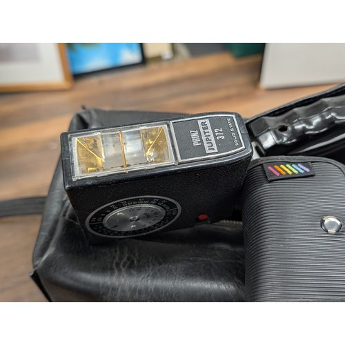 176 - A Collection of Vintage Cameras, Optical Instruments, and Photographic Accessories