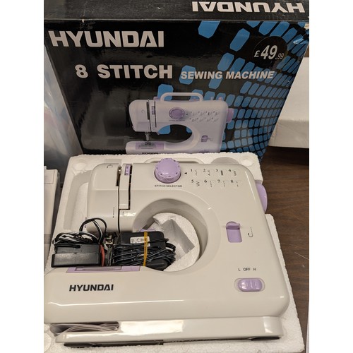 134 - A Collection of Sewing and Textile Craft Supplies Featuring a Hyundai 8-Stitch Sewing Machine, Instr... 