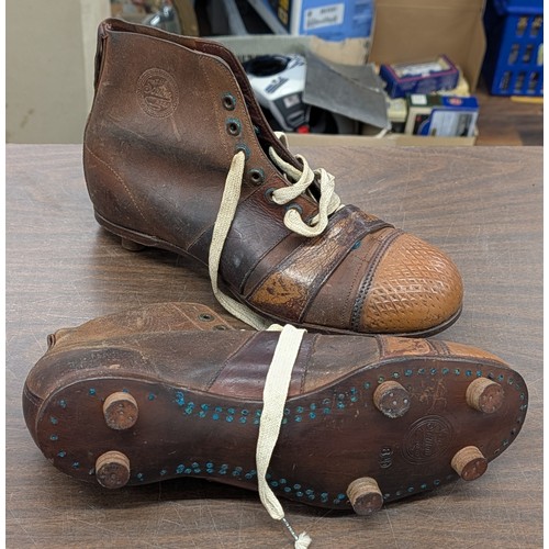 91 - A Pair of Vintage The Scrum Leather High-Top Rugby Boots