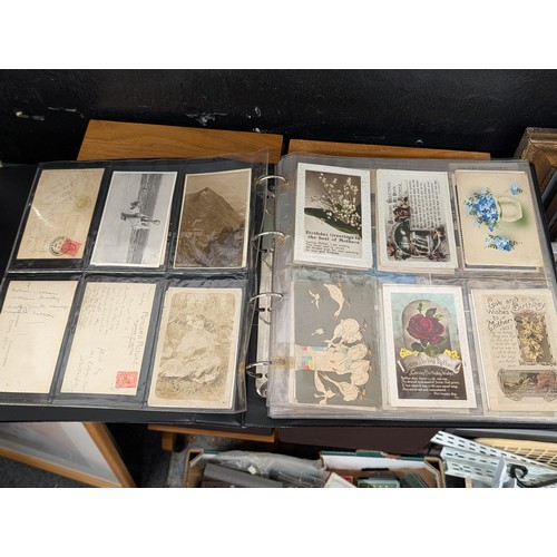 133 - A Large Collection of 200+ Early 20th Century Postcards and Ephemera in a Black Binder