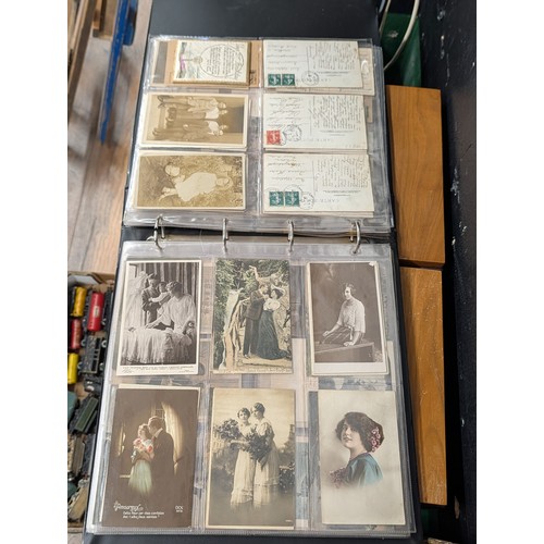 133 - A Large Collection of 200+ Early 20th Century Postcards and Ephemera in a Black Binder