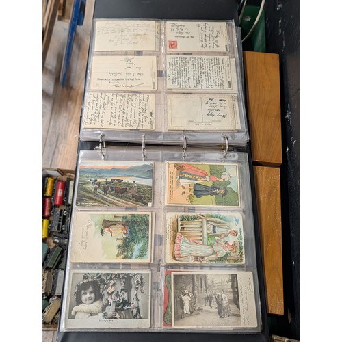 133 - A Large Collection of 200+ Early 20th Century Postcards and Ephemera in a Black Binder