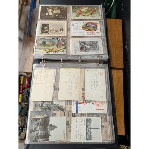 133 - A Large Collection of 200+ Early 20th Century Postcards and Ephemera in a Black Binder