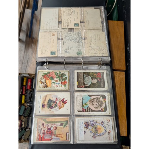 133 - A Large Collection of 200+ Early 20th Century Postcards and Ephemera in a Black Binder