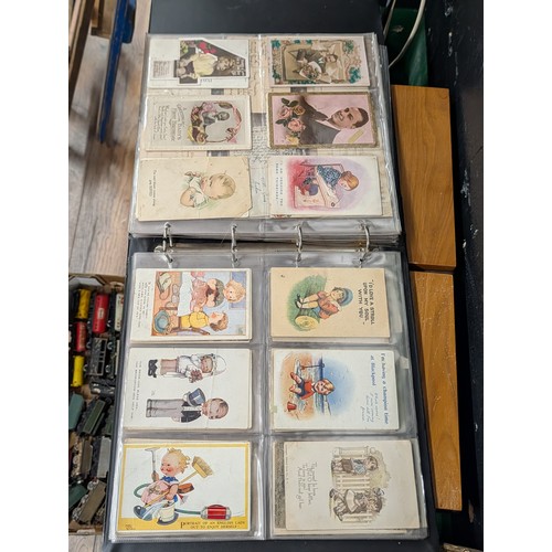 133 - A Large Collection of 200+ Early 20th Century Postcards and Ephemera in a Black Binder