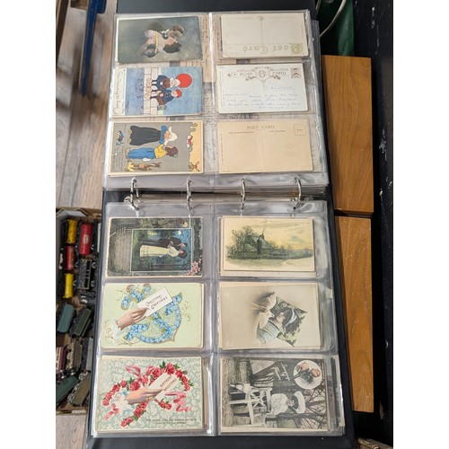 133 - A Large Collection of 200+ Early 20th Century Postcards and Ephemera in a Black Binder