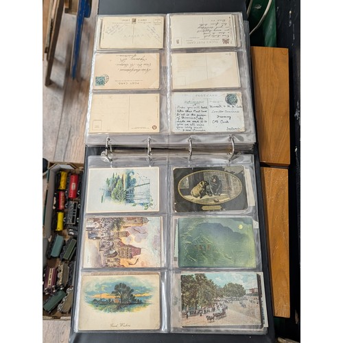 133 - A Large Collection of 200+ Early 20th Century Postcards and Ephemera in a Black Binder