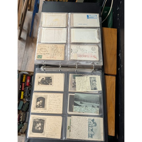133 - A Large Collection of 200+ Early 20th Century Postcards and Ephemera in a Black Binder