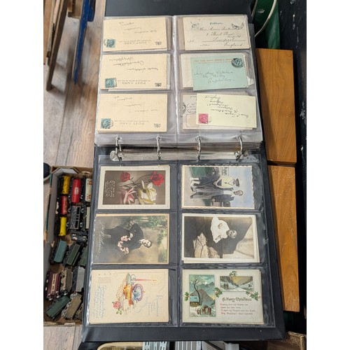 133 - A Large Collection of 200+ Early 20th Century Postcards and Ephemera in a Black Binder