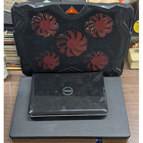 109 - Three-Piece Lot of Dell Laptops and Havit Cooling Pad, All Working But No Power Supplies