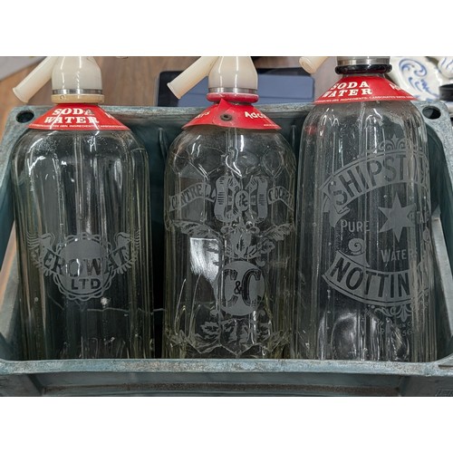 152 - Collection of Six Vintage British Etched Glass Soda Siphons in a Plastic Crate