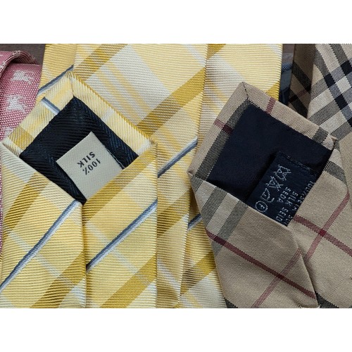 82 - Four Burberry London Silk ties