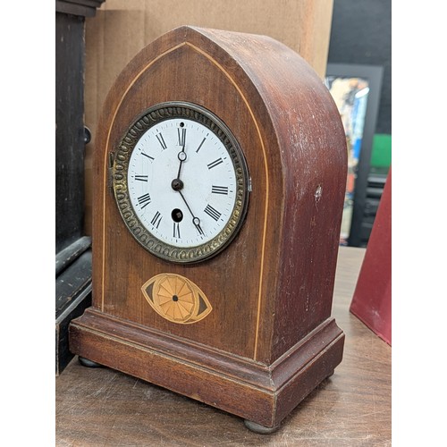 147 - Two Antique Wooden Mantel Clocks including a Junghans Ebonized Architectural Clock and a Gothic Revi... 
