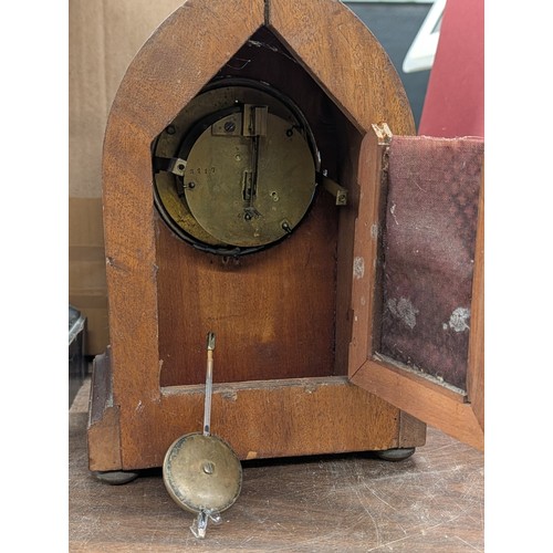 147 - Two Antique Wooden Mantel Clocks including a Junghans Ebonized Architectural Clock and a Gothic Revi... 