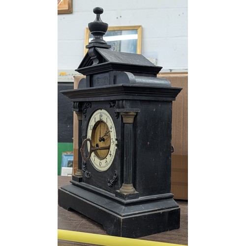 147 - Two Antique Wooden Mantel Clocks including a Junghans Ebonized Architectural Clock and a Gothic Revi... 