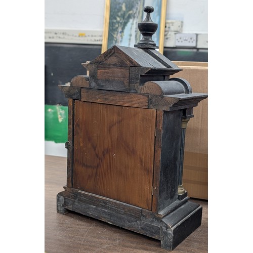 147 - Two Antique Wooden Mantel Clocks including a Junghans Ebonized Architectural Clock and a Gothic Revi... 