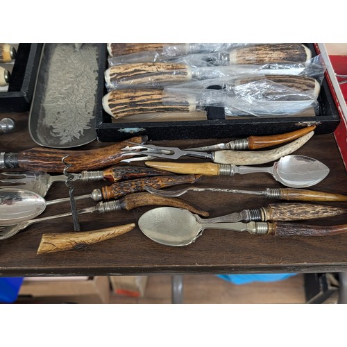 303 - Collection of Sheffield Stag Horn Handled Flatware and Serving Utensils/Table Ware - All proceeds fr... 