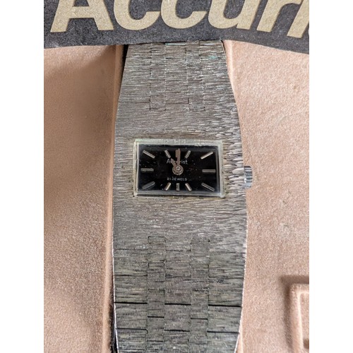 338 - Two Wristwatches Including a Timberland Analog-Digital Compass Watch and an Accurist Mechanical Ladi... 